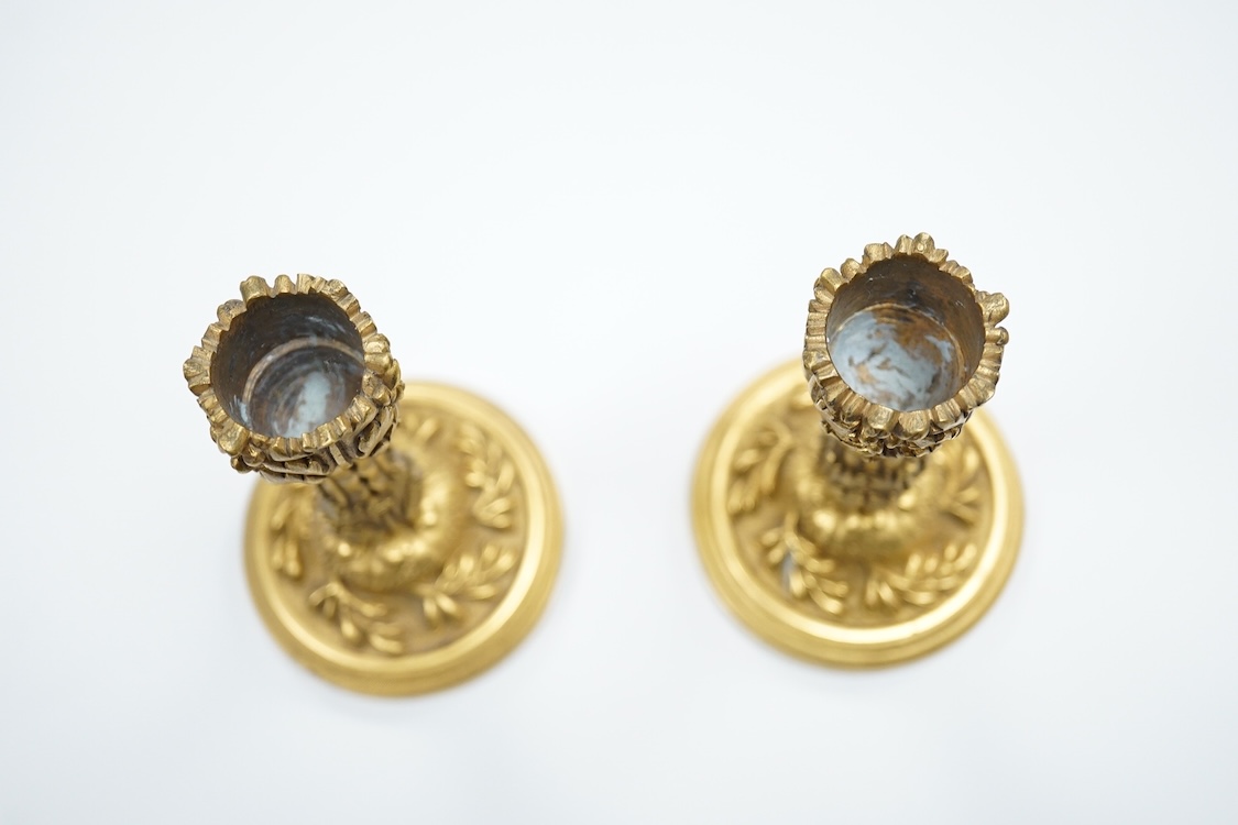 A pair of 19th century French ormolu candlesticks, stamped Le Maire Demouy a Paris 13cm high